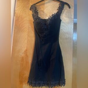 Stylish Black Dress with Floral Lace Neckline